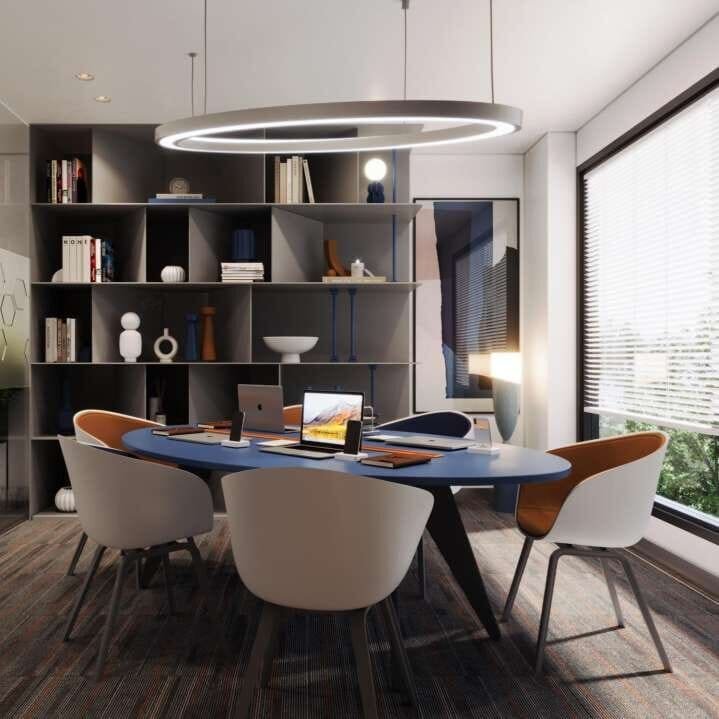 Breakout reading nook with built-in bookshelving and round meeting table