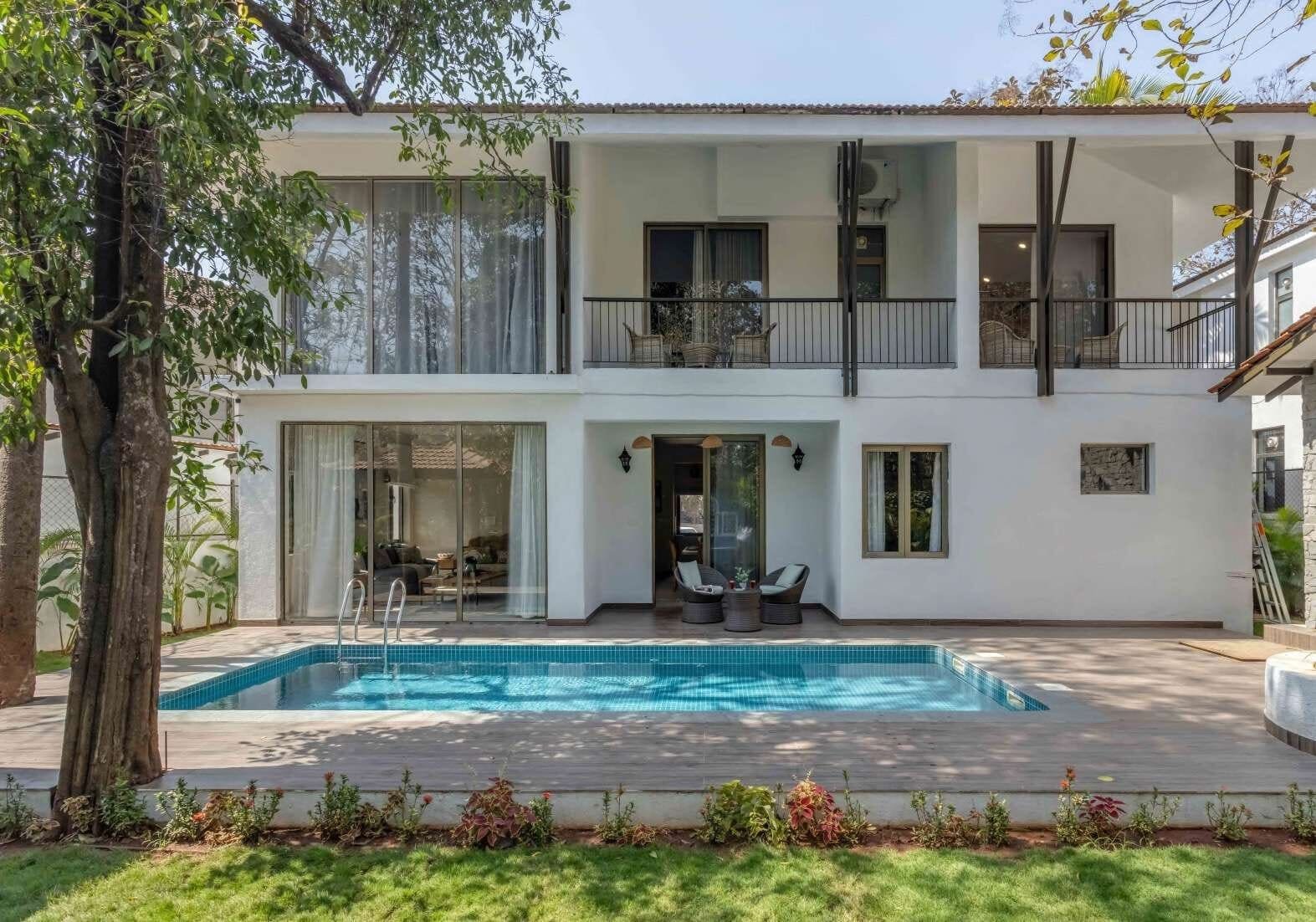 Goa villa facade with private pool and garden