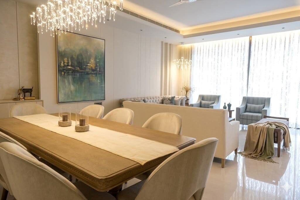 Gulmohar Enclave residence living area with curated furniture and warm lighting