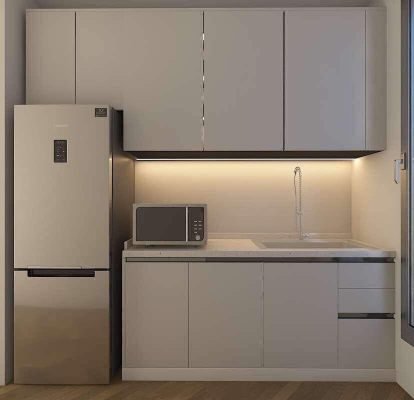 Compact kitchenette with integrated fridge and microwave