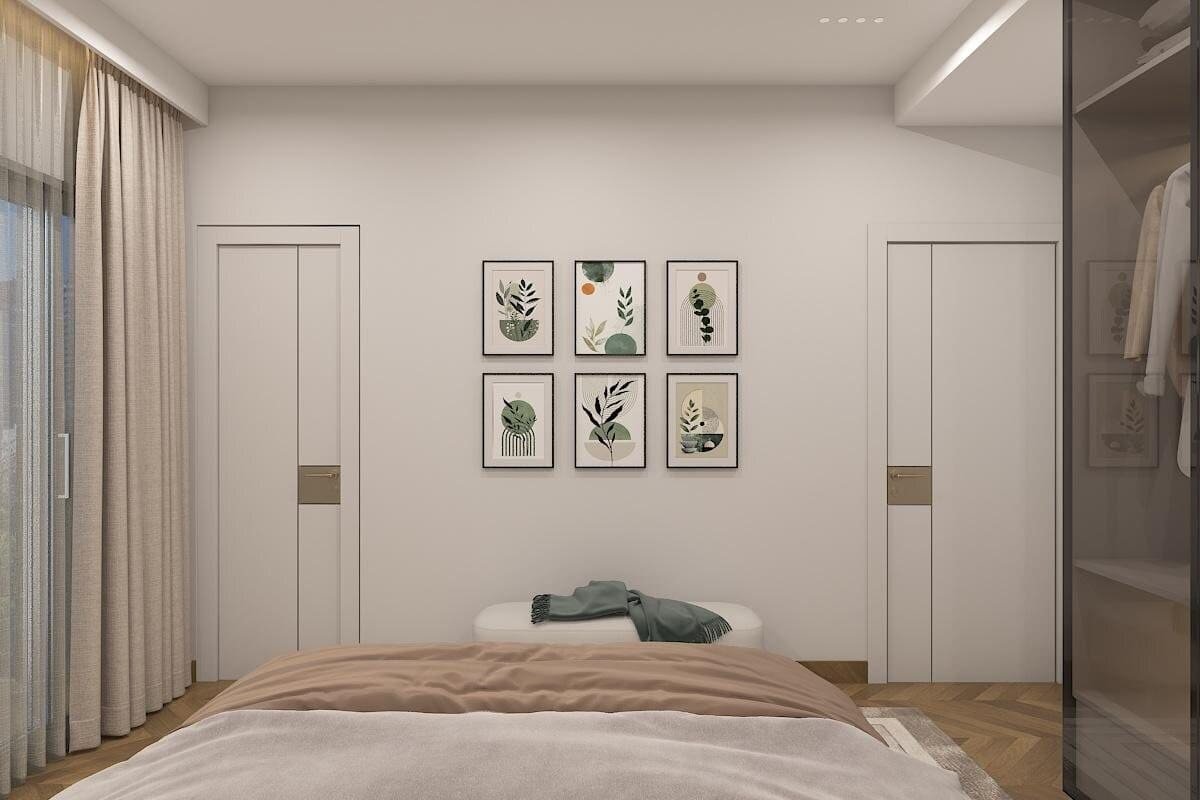 Bedroom with framed botanical prints and wardrobe beyond